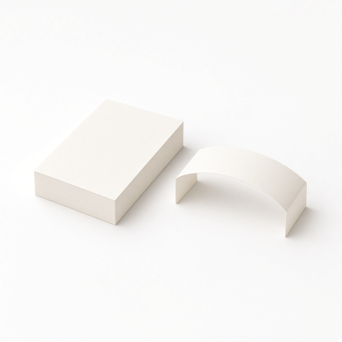 Blank paper cards and a folded sleeve